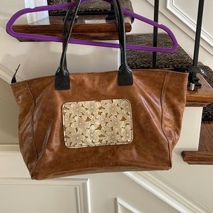 Genuine Leather made in Italy, bought Spain!